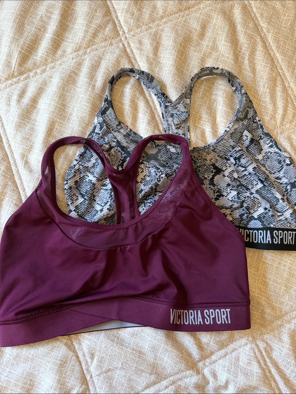 Two Victoria Secret light support Racerback Sports Bras